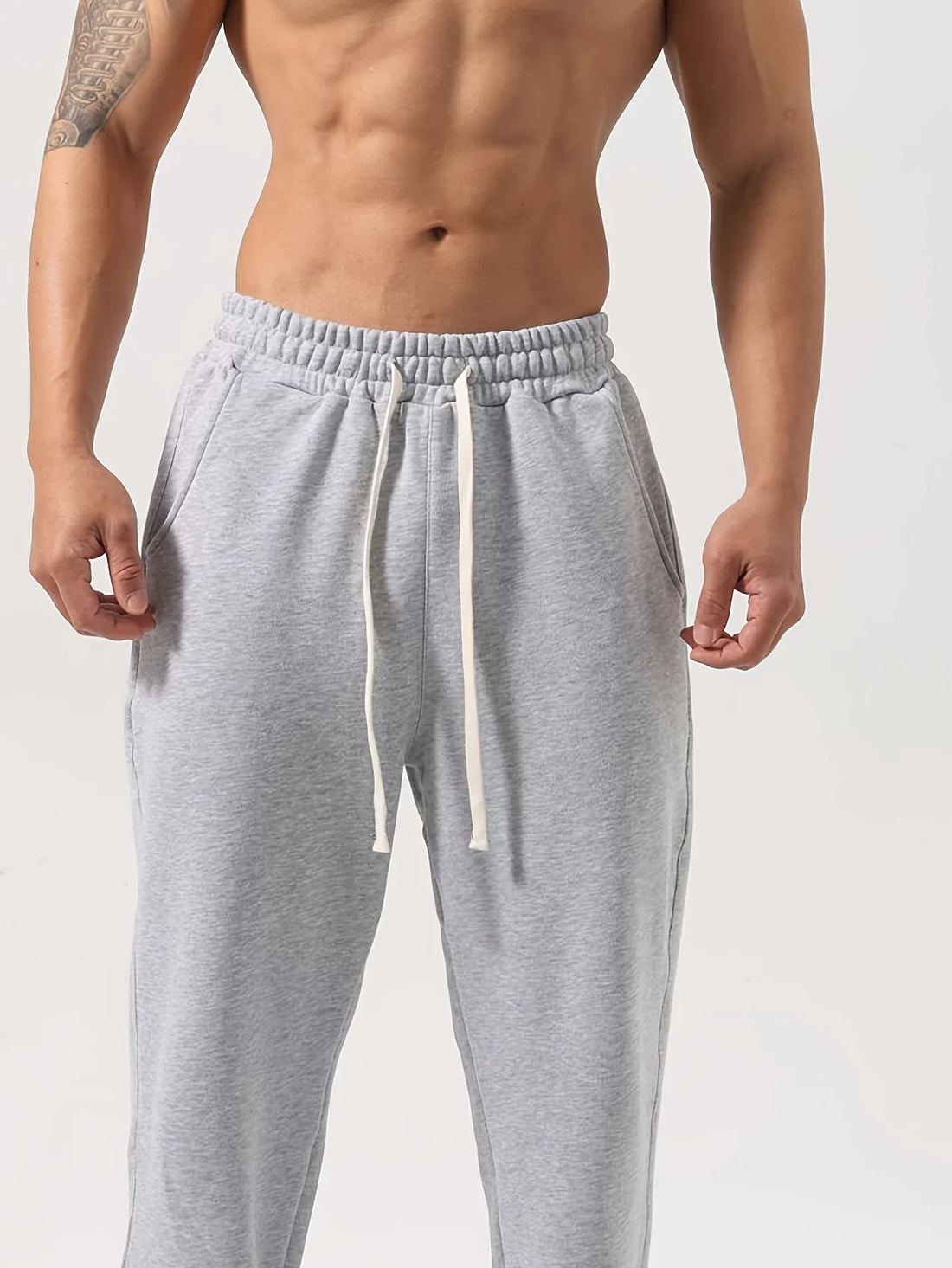 Men's casual athletic trousers loose-fitting straight leg wide-leg style elastic waistband simple solid color pants sweatpants