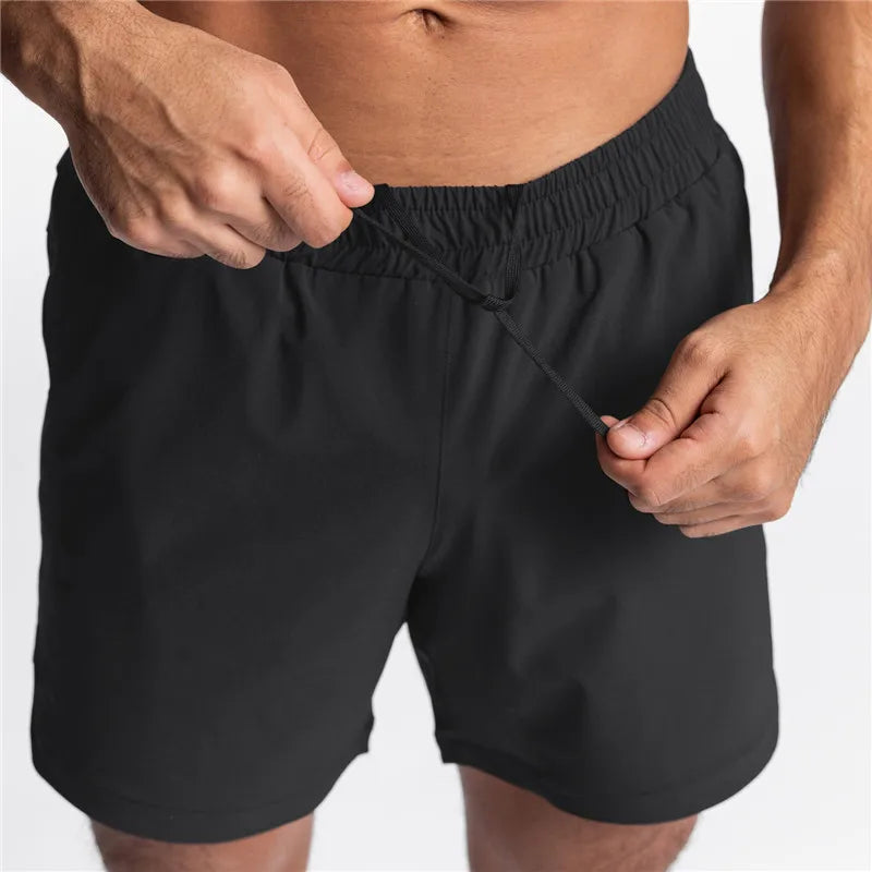 NEW Summer Running Shorts Men Sports Jogging Fitness Shorts Quick Dry Mens Gym Men Shorts Gyms Short Pants For Men Tahsi Fashion House