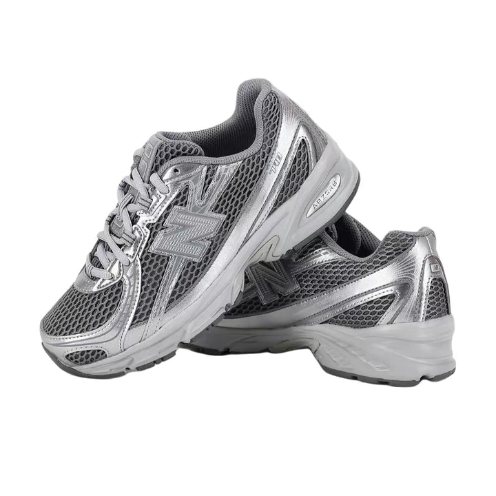 New Balance NB740 unisex low-top sneakers pair in silver with mesh upper and cushioned sole