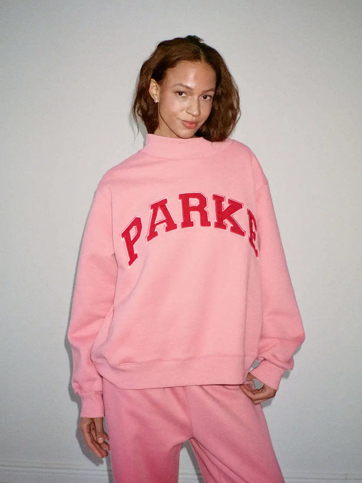 The round-neck single-piece pullover has exotic patterns in various colors. - ATFH