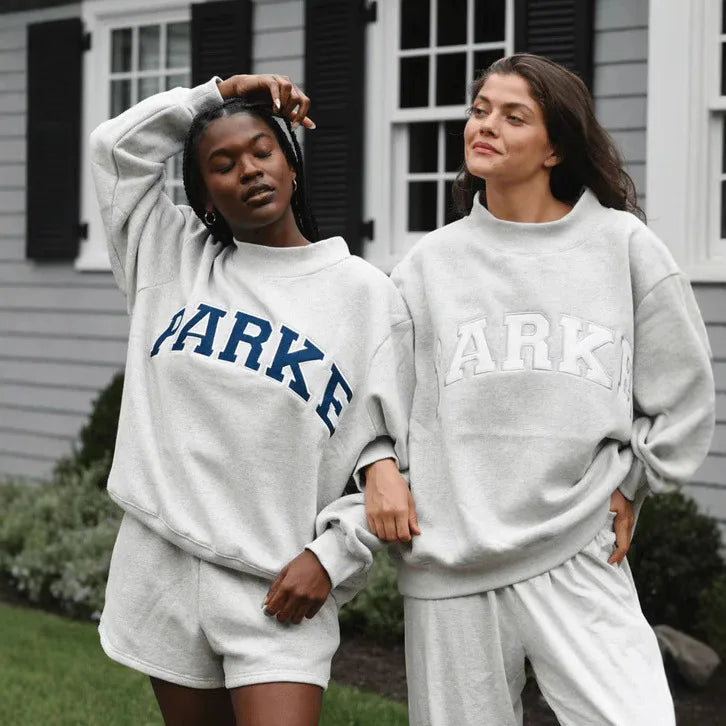 The round-neck single-piece pullover has exotic patterns in various colors. - ATFH