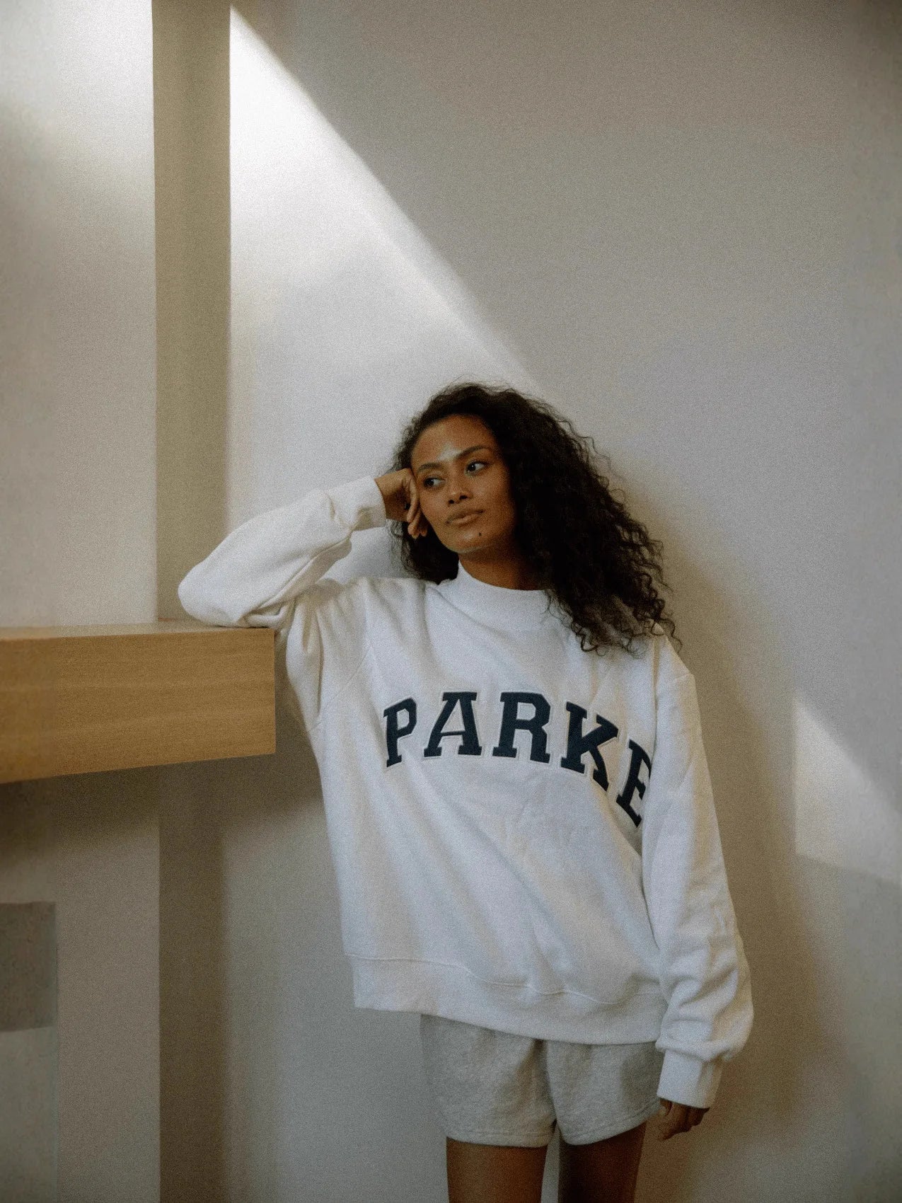 The round-neck single-piece pullover has exotic patterns in various colors. - ATFH
