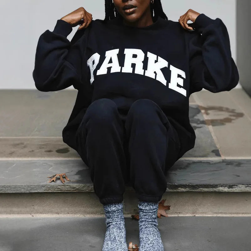 The round-neck single-piece pullover has exotic patterns in various colors. - ATFH
