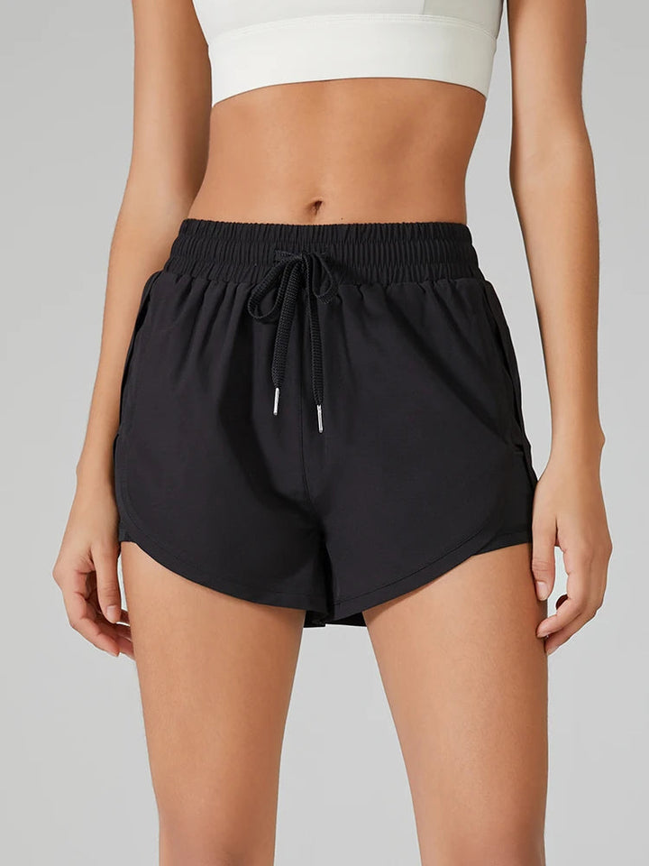 Women's Sports Jogging Loose Three Part Shorts Elastic Double Layer Side Pocket Breathable Running Fitness Leisure Yoga Shorts Tahsi Fashion House