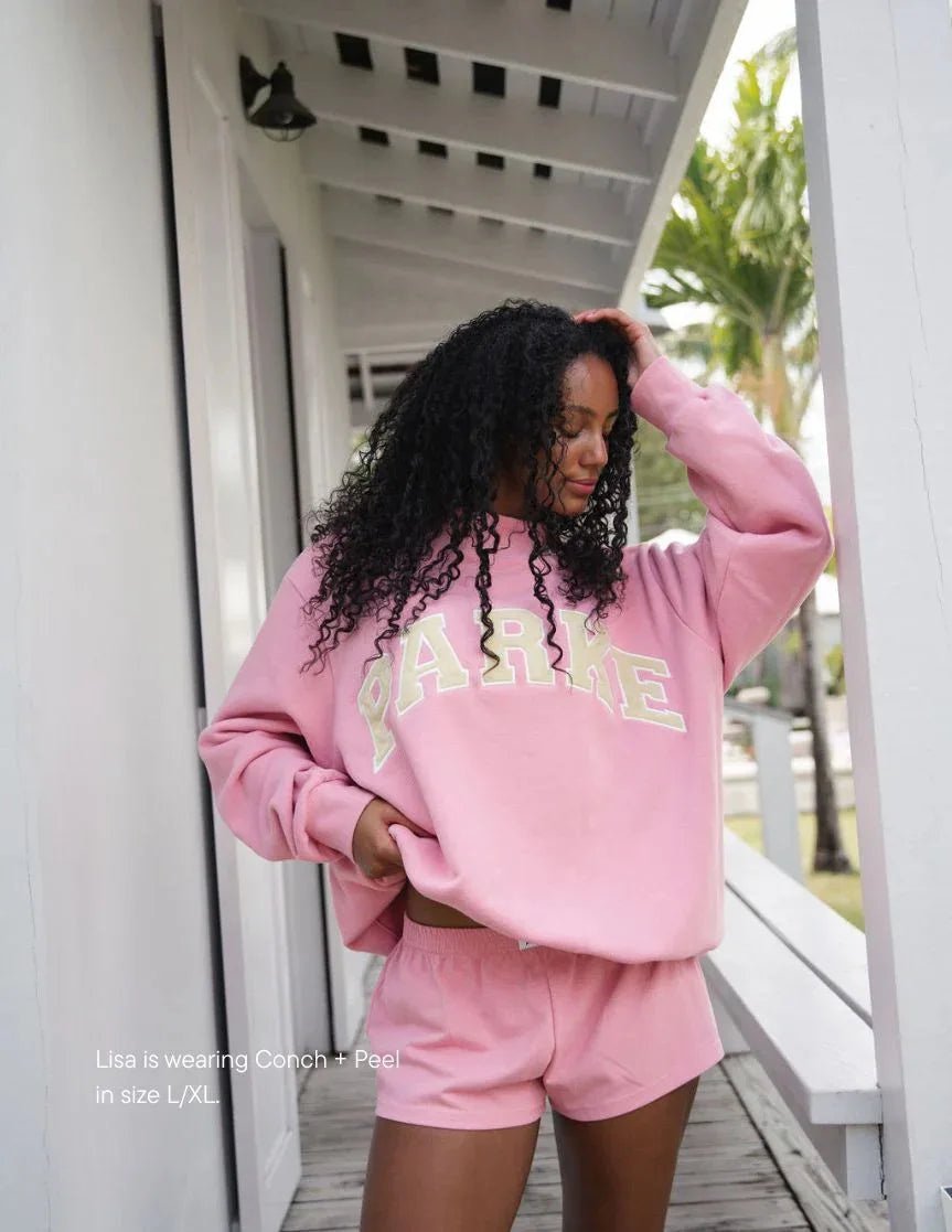 The round-neck single-piece pullover has exotic patterns in various colors. - ATFH