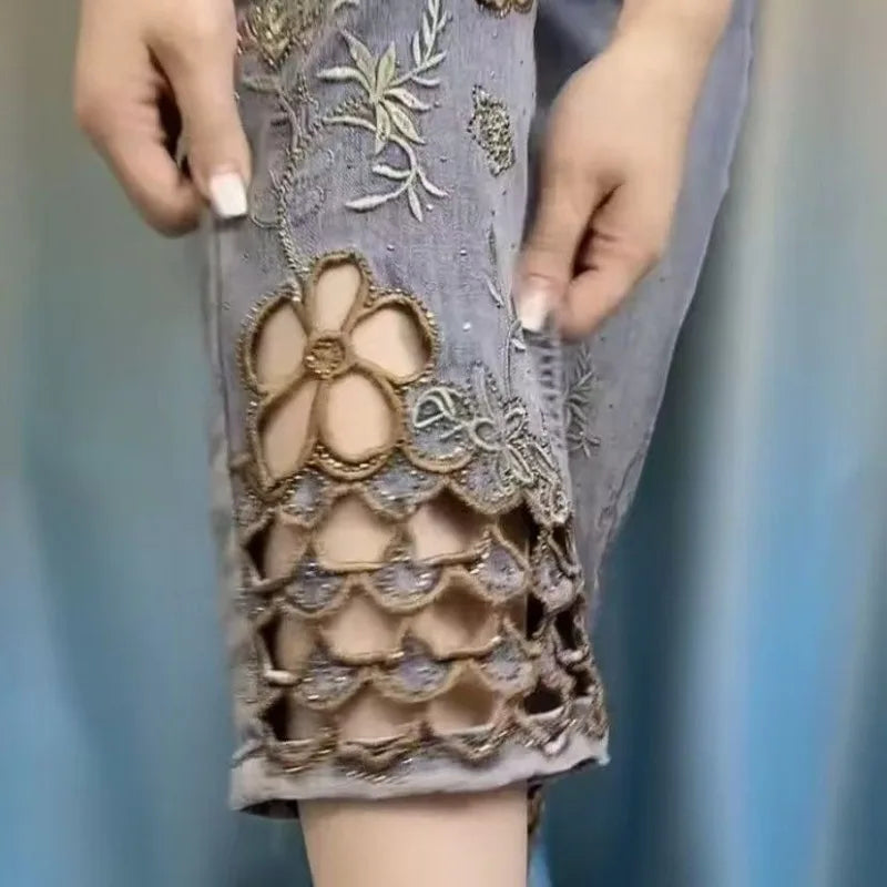 women High end hollowed out embroidered denim eight cigarette tube pants 2026 new summer thin high waist stylish denim tube pant ATFH