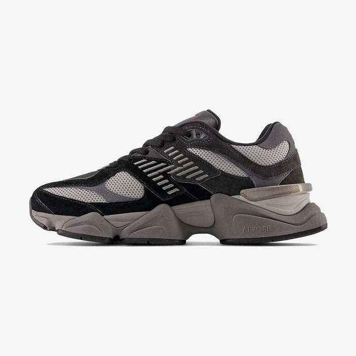 Sneaker black and gray breathable mesh upper with suede overlays; chunky gray sole and slip-resistant, ABZORB-inspired midsole